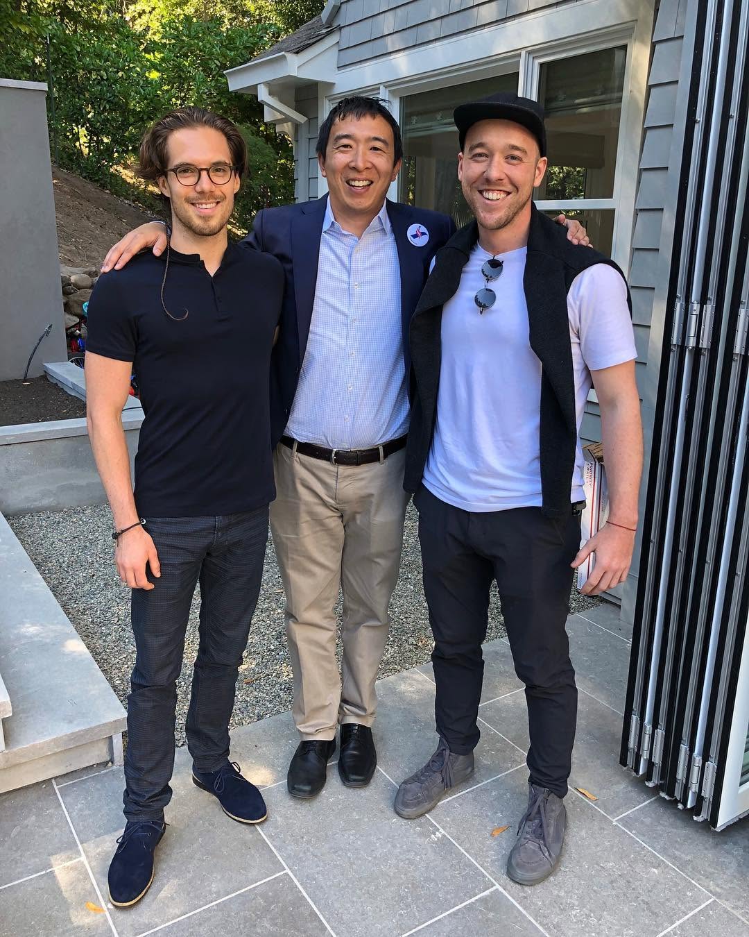Faust Whale and his best friend from college with Andrew Yang in summer 2018