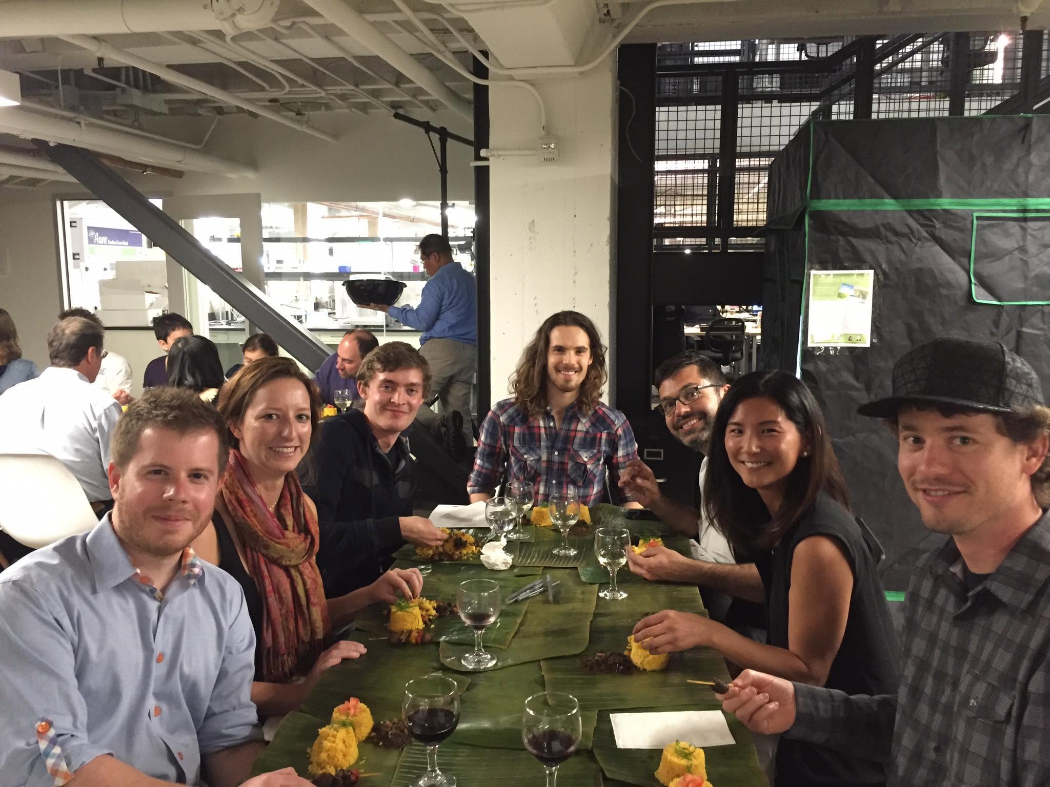 Faust Whale and friends sharing a Filipino meal in the basement of a biotechnology accelerator in 2016